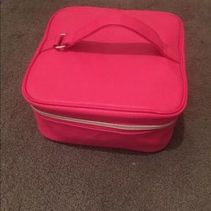 Pink Lancôme makeup bag